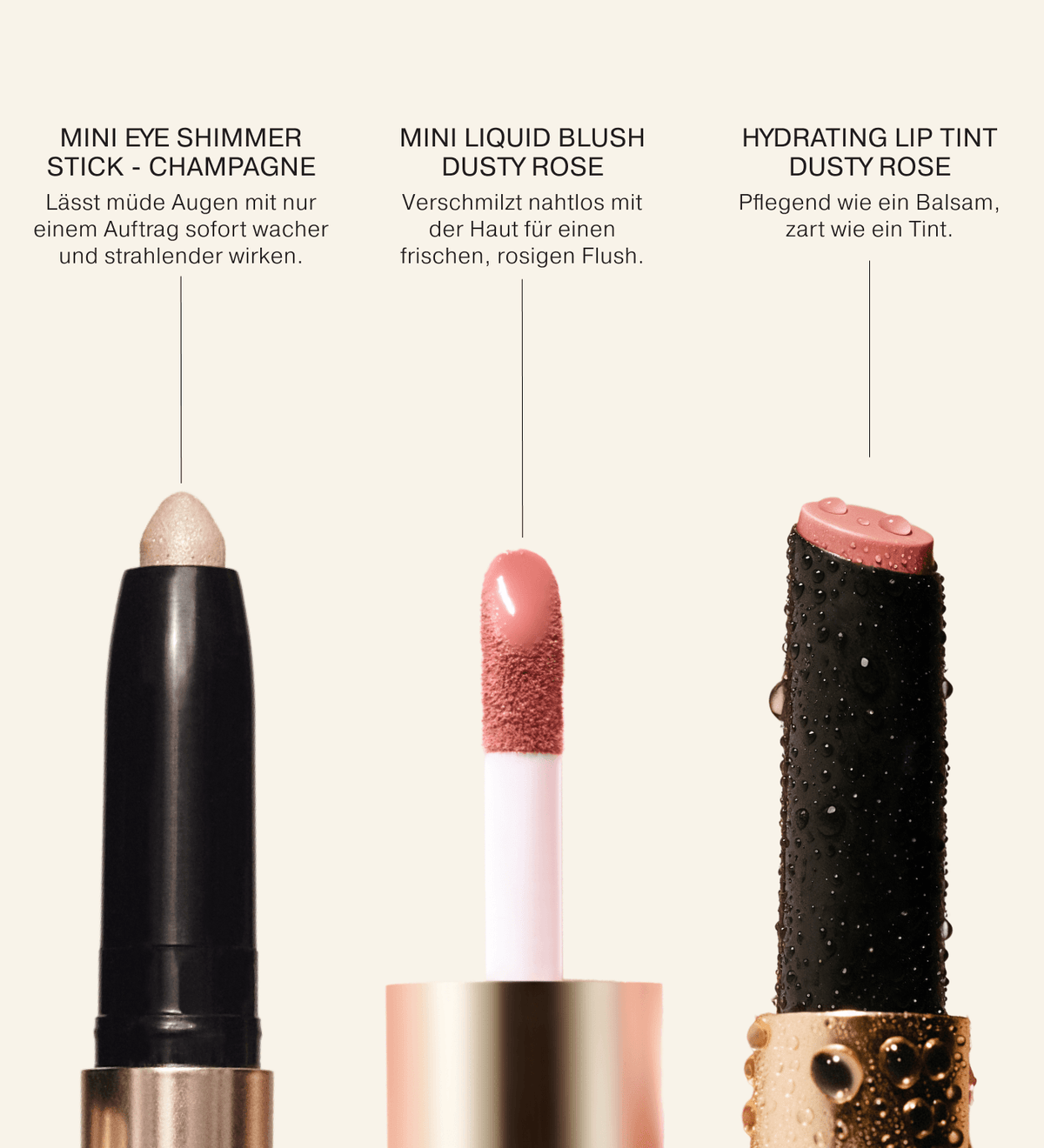 Soft Touch Trio mit Nahaufnahmen des champagne Eye Shimmer Sticks, des dusty rose Liquid Blush Applikators und des Hydrating Lip Tints.